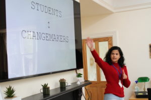 A student giving a presentation at Reach Cambridge.